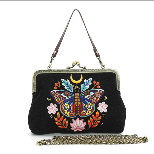 Moon moth vintage kisslock bag